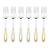 Set of six stainless steel dinner forks with gold-trimmed handles arranged in a row on white background